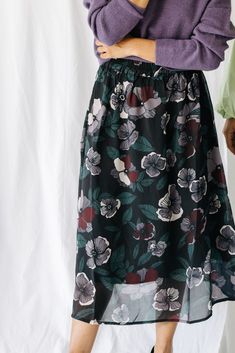 This lightweight chiffon maxi features a lovely floral pattern. From a chic blouse or sweater to a simple tee, this flowy and fun skirt goes with everything.