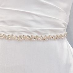 💖 Our Current New Shop Promotion 💖 Get a free 2 pcs CZ Bobby Pin Set with every order! Order now and enjoy the added sparkle and elegance! (: Simple Wedding Belt, Simple Wedding Dress Belt, Bride Dress Belt Enhance your bridal look with the enchanting Simple Wedding Belt. Embrace natural elegance with a stunning strand of pearls and shimmering crystals, perfect for nature-inspired weddings. 💖 Details - Embellishment measures 17.75 inches long and 0.6 inches wide - Handmade with sparkling rhin Pearl Wedding Dress Belt, Simple Veil, Strand Of Pearls, Beaded Veils, Pearl Wedding Dress, Pearl Veil, Bridal Sash Belt, Nature Inspired Wedding, Simple Wedding Dress