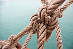 a close up view of ropes on a boat