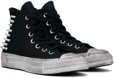 High-top canvas sneakers in black. · Smudging and fading throughout · Rubber cap toe · Lace-up closure · Logo patch and eyelets at inner side · Pyramid studs at sides · Rubberized logo patch at heel · Padded footbed · Treaded rubber sole Supplier color: Black/White/Black Vintage Black Cotton Sneakers, Black Cotton Vintage Sneakers, Vintage Black Sneakers With Speckled Midsole, Black Chuck 70, Black Chucks, Converse Black, Chuck 70, Converse Sneakers, Sneaker Collection