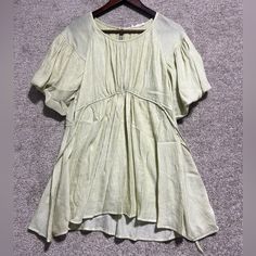 Blu Pepper Woman’s Baby Doll Tie Blouse Flutter Short Sleeve Light Green In Color Size Medium New With Tags Please See Pictures For Details On Condition And Measurements. Smoke Free Home Dog Friendly Home Colors May Vary Due To Lighting Ask Questions Before Purchasing Summer Butterfly Sleeve Top With Ruffle Hem, Spring Blouse With Ruffle Hem And Butterfly Sleeves, Green Puff Sleeve Top With Ruffles, Green Puff Sleeve Tops With Ruffles, Green Butterfly Sleeve Tops For Spring, Bohemian Short Sleeve Top With Ruffle Hem, Billowy Short Sleeve Blouse For Summer, Bohemian Short Sleeve Peasant Top With Ruffles, Cute Summer Blouse With Flutter Sleeves