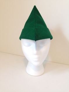 "Let your child believe in the magic of fairy tales as they dress up as Robin Hood, Peter Pan, a woodsman or prince! This adorable forest green felt hat will compliment their active imagination. Look no further for a quality handmade hat to complete a Halloween costume, school play outfit, a themed birthday party or for use as a photography prop. The pan hat also makes a great party favor or a gift for any occasion. The feather is made of two layers of felt and top stitched for quality and durab Halloween Costume School, Active Imagination, Robin Hood Hat, Hood Hat, Play Outfit, Believe In The Magic, School Play, Handmade Hat, Felt Hat