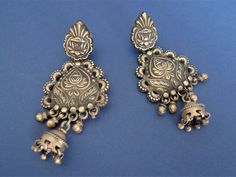 Astounding big silver earrings from Rajastan. Tribal earrings from Jaisalmer area, 92.5 silver masterfully carved. Notice! Earlobe piercings should be wide for these earrings. Length: 7.8 centimeters Weight. 22 grams each We keep the original patina of our vintage silver jewelry pieces, but it can be cleaned on request.  Shipping: Certified Post Office Mail with track number Thanks for your visit! Heavy Bohemian Sterling Silver Earrings, Heavy Antique Earrings For Festive Occasions, Sterling Silver Temple Jewelry Earrings With Intricate Design, Oxidized Finish Earrings For Rituals And Festivals, Silver Danglers For Festive Rituals, Traditional Antique Silver Earrings With Oxidized Finish, Traditional Plug Earrings With Intricate Design For Festivals, Traditional Antique Silver Oxidized Earrings, Traditional Intricate Design Plug Earrings For Festivals