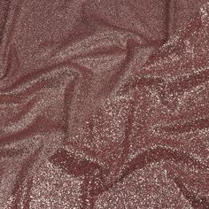 an image of glitter fabric textured in red and pink colors for background or wallpaper