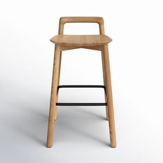 a wooden stool with a black seat on an isolated white background in the middle of the image