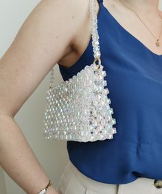 Beaded Bag in Clear Crystal bag, beaded handbag, sparkling bag, party bag, glitter bag, handmade bag, fancy bag, designer bag, evening purse Crystal beaded bags are popular choices for formal occasions, evening events, or any time when a touch of glamour is desired. They can add a statement-making element to an outfit and are often chosen to complement elegant dresses or evening gowns. The beaded texture of the bag not only adds visual interest but also provides a tactile and luxurious feel. Whe Handmade Rectangular Shoulder Bag For Party, Glamorous Rectangular Sequin Shoulder Bag, Handmade Square Clutch For Party, Square Embellished Shoulder Bag For Party, Embellished Square Shoulder Bag For Party, Beaded Shoulder Bag For Party, Sequined Rectangular Bag For Events, Rectangular Sequined Bag For Events, Rectangular Sequin Bag For Events