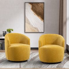 two yellow chairs sitting next to each other in a living room