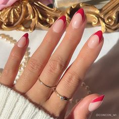 Embrace a classic look with a twist in the Rose Garden Nail Set. These semi-translucent short almond nails feature a deep red tip that brings instant sophistication to any outfit. Perfect for date nights or adding a pop of color to your daily style! Key Features Length: Short Shape: Almond Finish: Glossy Opacity: Semi-Transparent Thickness: 0.6mm Reusable, each wear lasts up to 2 weeks Waterproof Customizable Vegan & Cruelty-free Red Love Heart Acrylic Nails, Valentines Nails Red Tips, Red Nail Designs With Heart, Red French Tip Nails With Heart Design, Red French Tip Nails Almond With Heart, Red Tip Oval Nails, Red Heart Tip Nails, Red French Nails With Heart, Red French With Heart