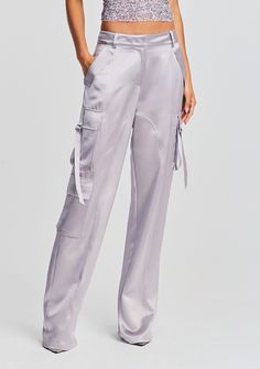 The André Pant is a glamorous twist to the on-trend cargo pant. Our version features the utilitarian details—side pockets and a wide leg—reimagined in a silky fabrication, perfect for going out. Shown here in Mink Grey. 76% Acetate, 24% Polyester Made in China Model is 5'10" wearing size S Style No. SS23-6539 Chic Wide Leg Cargo Pants With Flap Pockets, Chic High-waisted Parachute Pants With Cargo Pockets, Chic High-waisted Cargo Pants With Flap Pockets, Chic Straight Cargo Parachute Pants, Chic Straight Parachute Pants With Cargo Pockets, Chic Cargo Style Straight Parachute Pants, Chic Cargo Pants With Cargo Pockets, Chic Wide-leg Parachute Pants With Cargo Pockets, Chic Straight Cargo Pants With Pockets