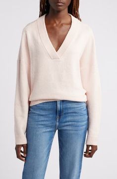 An oversized fit feels so right and relaxed in this V-neck sweater knit from cotton-blend yarn. V-neck Long sleeves Dropped shoulders Ribbed cuffs and hem 56% cotton, 19% acrylic, 18% polyester, 5% nylon, 2% spandex Hand wash, dry flat Imported Sweater Knit, Pink Sweater, V Neck Sweater, Vneck Sweater, Neck Sweater, Sweater Top, Knitted Sweaters, Top Brands, Cotton Blend