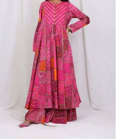 Multi-colour Frock, Multi-colour Shirt, Multi-colour kameez  Description:  The pink shirt is a vibrant and eye-catching piece of clothing. It's made from a soft and lightweight material that drapes effortlessly over the body, making it comfortable to wear. The shade of pink is a bright and playful hue that adds a pop of colour to any outfit. The shirt features a classic collar and button-front design, with long sleeves that can be rolled up for a more casual look. It's a versatile piece that can be dressed up with a trouser  or  palazzo for a more laid-back vibe. Overall, the pink shirt is a stylish and fun addition to any wardrobe. Fabric: Lawn  Sleeve-length: Full  Frock Length :Long Lawn Long Frock Design, Full Frock, Frock Long, Lawn Frock, Pink Frock, Long Kameez, Pakistani Women, Pakistani Women Dresses, Latest Dress Design