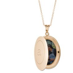 Made of stainless steel, with your choice of silver, gold or rose gold finish. Oval Locket measures 1.2 x 0.9, photo insert measures 0.9 x 0.6. Heart Locket measures 1.07 x 1.09, photo insert measures 0.8 x.85. Engraving available on front side only. Photos already sized and inserted inside. Comes with 18 coordinating chain and gift box. Imported. Personalized in USA Gold Personalized Round Locket Necklace, Personalized Gold Round Locket Necklace, Personalized Round Gold Locket Necklace, Gold Round Locket Necklace For Personalized Gift, Oval Gold Stainless Steel Jewelry, Rose Gold Round Locket Necklace For Gifts, Round Rose Gold Locket Necklace For Gifts, Gold Oval Pendant Jewelry For Personalized Gift, Oval Link Stainless Steel Necklaces For Gifts