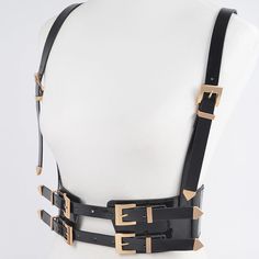 Take your fashion game to the next level with our Faux Leather Harness! Made from high-quality faux leather, this harness adds a touch of edge to any outfit. Perfect for dressing up or down, you'll be turning heads with this unique piece. (Watch out, Lady Gaga!) * POLYURETHANE/ ELASTIC. * APPROX. WIDTH:39".LENGTH:28" Leather Harness, Jean Accessories, Dressing Up, Custom Tees, Mens Swimwear, Lady Gaga, Belt Bag, Next Level, Fashion Games