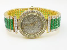 Made of 925 Sterling Silver, this exquisite women's watch features green princess-cut in invisible set CZ stations which means they are clustered next to other to achieve the maximum sparkle and fire. The dial of the watch features tiny white CZ stones, which measures 35mm. Metal: Solid 925 Sterling Silver Stones: Cubic Zirconia Grade: AAAAA Cut: Excellent Clarity: Excellent Why Buy from Adastra? 1. The USA patented 925 Sterling Silver, making each creation last for decades. 2. Each of our produ Diamond Round Watches As Gift, Diamond Watch Gift With Round Shape, Diamond Watches As Gifts With Round Shape, Gift Diamond Watch Round Shape, Diamond Watch As A Gift, Gift Diamond Watch With Round Shape, Cubic Zirconia Jewelry With Round Dial For Gifts, Timeless Round Diamond Watch Gift, Timeless Round Diamond Watch As Gift