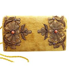 "Looking for a unique and beautiful purse? Here it is! A gold yellow velvet clutch bag embroidered with bronze flowers and inlaid with genuine semi precious stones, inlcuding orange carnelian and dark red garnets. Just the right amount of bling! Versatile, can be dressed up or down. Wear it to brunch with friends, to the theatre and just out for fun. Expertly hand embroidered by master zardozi artisans. Zardozi means \"gold thread\" or \"writing with gold\". It is an elaborate multidimensional e Bronze Flowers, Peacock Clutch, Velvet Clutch Bag, Formal Clutch, Hand Hold, Velvet Clutch, Floral Clutches, Wedding Clutch, Statement Bag