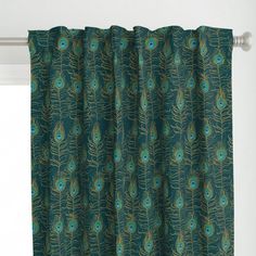 a curtain with a peacock print on it