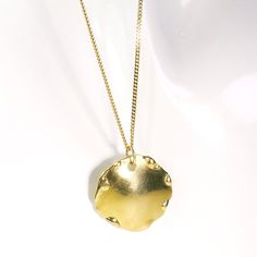 "𝗪𝗔𝗡𝗧 𝟭𝟬% 𝗢𝗙𝗙 𝗧𝗢𝗗𝗔𝗬? Get your code at https://bit.ly/2Jlkfoz (Just copy and paste that into your browser.). --------------------------------------------------------------- Trendy contemporary 14k gold charm pendant necklace with a round domed disc charm. This pendant has a powerful raw feeling, with molten accents on the rim. The shape is reminiscent of the shape of a hang musical instrument, which produces a powerful mesmerizing sound. The texture is of the kind you will want to t Modern Coin Pendant Necklace As Gift, Everyday Round Tarnish Resistant Medallion Necklace, Everyday Round Medallion Necklace Tarnish Resistant, Gold Plated Coin Necklace, Everyday Round Tarnish-resistant Medallion Necklace, Hammered Round Medallion Necklace As Gift, Everyday Yellow Gold Medallion Necklace, Tarnish Resistant Round Brass Coin Necklace, Brass Coin Necklace With Round Pendant