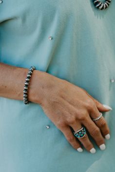 Time to up your arm candy game. Navajo pearl cuff. Rigid and stays in place. Wear alone or add to your arm party. Navajo Made Sterling Silver Measures: Width - 2.75" | Opening - 1.5" Southwestern Festival Beaded Bracelets, Nfr Style, Authentic Turquoise Jewelry, Native American Paintings, Candy Games, Pearl Cuff, Arm Party, Top Graphic Tees, Arm Candy