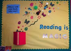 a bulletin board with writing on it that says reading is magic and butterflies are flying around