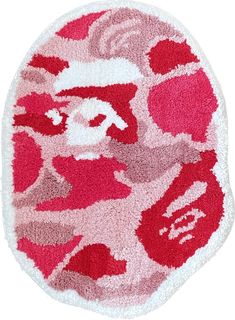 a red and white rug with an image of a woman's face on it