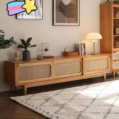 a living room scene with focus on the entertainment center and rug in the foreground