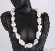 ♥Details: ♥Metal: Freshwater pearl ♥Model:NL2379 ♥ Pearl Size: 15-17X21-25MM (Approx) ♥Necklace  length:please choose If you need other special size, please tell me.  ♥ Pearl Shape:baroque ♥ Color:white，gray ♥ Pearl skin: clean, with little flaws ，if there are some small pits on the pearls that formed naturally during the growth process ♥ Grade(my shop): AA+ ♥ Pearl luster: good ♥ Body: please look at picture ♥ Clasps style( silver /glod/rose glod plated): please choose ♥We have 35 kinds of clasps, including gold/rose gold and silver clasps. I have numbered the clasp. You can choose your favorite clasp style through the clasp option. For example, No.1, No.2, No.3 Another option is to select the desired necklace length. ♥We accept customized necklaces. If you cannot find the required neckla Single Strand Baroque Necklace For Weddings, Baroque Single Strand Necklace For Weddings, Elegant Baroque Necklaces For Wedding, Baroque Pearl Necklace For Wedding, White Baroque Necklace For Formal Occasions, Handmade Pear-shaped Necklace For Wedding, Handmade Baroque Necklace For Wedding, White Pear-shaped Necklace For Wedding, Elegant Baroque Necklace For Wedding