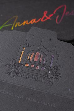 some type of business card that has been designed to look like a building with lights on it