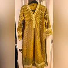 Brand New. Bought It From Pakistan But Didn’t Fit Me Chest 21 To 21.5 Almost Long Shirt And Trouser Has Lace At The Bottom Fitted Long Sleeve Salwar Kameez With Gota Work, Bollywood Lawn Suit With Gota Work And Long Sleeves, Festive Long Sleeve Lawn Suit With Gota Work, Yellow Long Sleeve Kurta With Mirror Work, Festive Gold Palazzo Set With Long Sleeves, Gold Long Sleeve Palazzo Set For Festive Occasions, Festive Gold Lawn Suit With Long Sleeves, Festive Gold Long Sleeve Lawn Suit, Gold Long Sleeve Lawn Suit For Festivals