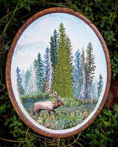 a painting of an elk in the woods