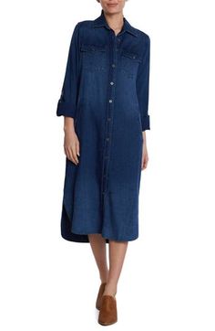 Western details lend country charm to a denim midi shirtdress fashioned with roll-tab sleeves and a curved hem. Front button closure Spread collar Long sleeves with roll-tab cuffs Chest button-flap patch pockets; front welt pockets Curved hem Unlined 65% cotton, 35% lyocell Machine wash, tumble dry Imported Fall Midi-length Shirt Dress With Roll-up Sleeves, Spring Midi Shirt Dress With Roll-up Sleeves, Spring Dark Wash Button-up Shirt Dress, Dark Wash Button-up Shirt Dress For Spring, Denim Shirt Dress With Buttons For Daywear, Spring Indigo Button-up Denim Dress, Denim Button-up Shirt Dress For Daywear, Button-up Denim Shirt Dress For Daywear, Summer Denim Dress With Button Cuffs