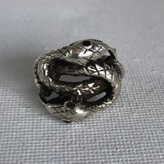 This Vintage Art Nouveau Ring Is Unique. It Is A Two-Headed Snake With Slightly Different Stones In The Eyes Of Each Snake. They Intertwine To Form A Meld Of Yin Yang, Celtic, And Infinity Symbols. Hallmarked Sterling. Us Size 5 Has A Nice Solid Heavy Weight Of 7g But Feels Comfortable On Your Finger. Intricate Detail. Definitely A Conversation Piece! Unique Sterling Silver Snake Ring For Formal Occasions, Symbolic One-of-a-kind Silver Jewelry, Vintage Silver Snake Jewelry, Collectible Symbolic Sterling Silver Snake Ring, Sterling Silver Snake Ring Collectible Symbolic, Sterling Silver Symbolic Snake Ring Collectible, Handmade Silver Symbolic Snake Ring, Handmade Symbolic Silver Snake Ring, Handmade Symbolic Sterling Silver Snake Ring