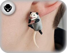 Get yourself some opossum friends to help you through your day! These guys were a little clumsy and seem to have gotten a bit stuck, but in true opossum fashion, they'll just pretend they're cool with it. Ahhhhhhh These earrings are 3D printed, then painted and fitted with a solid stainless steel earring post and backing. They come as a pair. Jewelry 2022, Dr Wardrobe, Awesome Possum, Weird Jewelry, Funky Earrings, Funky Jewelry, Body Mods, Stainless Steel Earrings, Pretty Jewellery