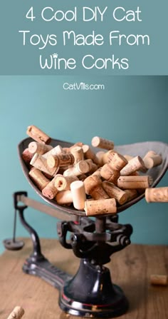 a bowl filled with wine corks sitting on top of a table