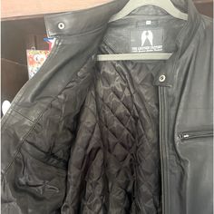 Brand New Condition Mens Black Leather Jacket With Nylon Lining. Moto Jacket Style But Very Classy! Could Be Worn On The Bike Or To The Office! Genuine Leather With No Imperfections, Non Smoking House. Fits Like A Generous Xl As Most Jackets That I Own Are Xl But If You Are On The Line Between Xl And 2x It Will Fit Perfectly, If You Normally Wear Xl It Won't Be Too Big. Black Biker Jacket With Ykk Zipper, Black Motorcycle Outerwear With Durable Zipper, Classic Outdoor Biker Jacket With Zipper Closure, Classic Biker Jacket With Zipper Closure For Outdoor, Classic Biker Jacket With Zipper Closure, Black Biker Jacket With Zip Fly For Outdoor, Black Biker Jacket For Outdoor, Black Biker Jacket With Zip Fly For Motorcycling, Black Moto Leather Jacket For Outdoor