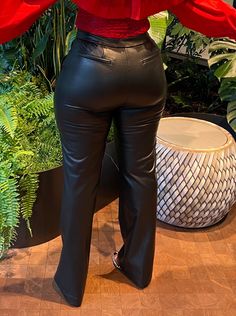 Elevate your fashion game with our "Sleek Faux Leather Trousers" – where timeless elegance meets modern sophistication in a perfect harmony of style. These trousers are a statement piece designed to make heads turn. Crafted from high-quality faux leather, they embody the allure of genuine leather without compromise. The sleek silhouette and clean lines create an effortlessly chic look that seamlessly transitions from day to night. With a comfortable and flattering fit, these trousers offer both Faux Leather Trousers, Leather Pants Outfit, Plus Jumpsuit, Perfect Harmony, Leather Trousers, Plus Dresses, Rain Wear, Pants Outfit, Ladies Day