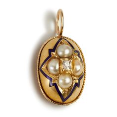 A perfect example of Victorian craftsmanship.  This charming elongated oval pendant started its life as a stick pin.   Beautiful mounded shape with a cobalt blue enamel star at the border and set with 4 creamy white seed pearls and a rose cut diamond at its center.  I've added a modern polished 14KT handmade back to make it comfortable to wear and an oval handmade bale to allow it to go through many different width chains.  Small in scale at 17mm in height by 9 mm wide. Perfect on its own around the neck or worn with other chains and pendants.  2.5 grams 14 KT.  Not marked but tested.  English in origin.  Chain may be purchased separately. Classic Oval Enamel Jewelry, Elegant Oval Enamel Jewelry, Oval Enamel Jewelry For Wedding, Oval Enamel Wedding Jewelry, Elongated Oval, Stick Pins, Seed Pearl, A Stick, Oval Pendant