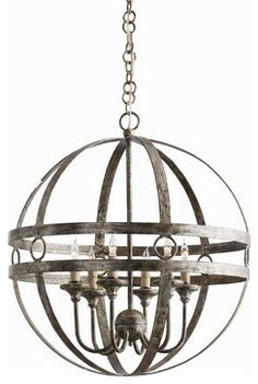 an orb chandelier with candles hanging from the bottom and two rings on each end