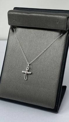 925 Sterling Silver Cross Pendant. High Polish Minimalist Cross Pendant With Diamond CZ Stone. Cross Necklace Charm. Silver Cross Necklace Our silver is genuine 925 sterling silver. You will receive the item in a gift pouch. This is a beautiful necklace, sure to make you feel special. Treat yourself or give as a gift! Perfect for everyday wear! ------------------------------------- Do Visit our Shop for more jewelry: https://www.etsy.com/shop/InsiaJewelry ---------------------------------- All j Silver Polished Cross Pendant, Silver Tarnish-resistant Cross Necklace For Gift, Adjustable Silver Cross Necklace, Nickel Free, Sterling Silver Nickel-free Cross Necklace, Nickel-free Sterling Silver Cross Necklace For Gift, Stone Cross, Silver Cross Necklace, Sterling Silver Cross Pendant, Silver Cross Pendant