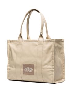 Looking for a trusty companion for your daily adventures? This large beige tote bag is just the thing, combining style and functionality effortlessly. It's like having a reliable friend by your side, ready to carry everything you need with a touch of elegance. Season: FW24 Color: Beige Size: One Size Department: Women Section: Bags Family: Totes Composition: 100% Cotton Made in: Vietnam Beige Uni, Beige Tote Bag, Beige Tote, Marc Jacobs Bag, Diaper Backpack, Large Tote Bag, Womens Tote, Large Tote, Flip Flop