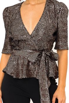 Bring in the new year with Bella Chic's Glam Up Sequin Top! This sequin peplum top features allover sequin embellishments, adorable short sleeves, a v-neck and tie belt that sinches your waist! Dazzle and Shine in this one of a kind piece. You'll be the bell of the ball in this copper sequin top! Check out Bella Chic's collection of Tops for unique pieces. - CONTENTS & CARE- 100% POLYESTER- HAND WASH COLD, DO NOT BLEACH, AIR DRY FLAT- IMPORTED Party V-neck Top With Tie Waist, Party Top With Tie Waist And V-neck, V-neck Top With Tie Waist For Party, V-neck Glitter Top For Party, Contrast Sequin V-neck Top For Party Season, V-neck Contrast Sequin Top For Party Season, Metallic V-neck Top For Party, Peplum Top Outfits, Sequin Peplum Top