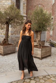 This black dress is all about fun and flexibility, with a drawstring neckline and elastic back ensuring a perfect fit. Its pleated bust adds a touch of allure while the flowing silhouette keeps things playful. Lined for comfort, this dress allows for effortless class. Sizes: S-M / M-L S-M: Length 44.1 in - Width 12.99 in M-L: Length 45.28 in - Width 13.78 in 70% viscose - 30% polyamide Washing: handwash only Parisian Summer, Drawstring Neckline, Summer Fashion, Perfect Fit, Black Dress, Elastic, Fashion Design, Clothes, Black