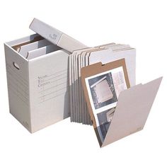 an open file box with several files in it and the lid opened to reveal photos