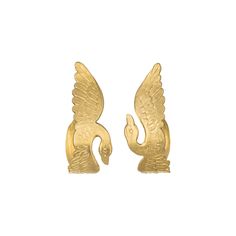 pair of gold earrings with an eagle design on the front and back of each ear