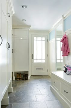 the hallway is clean and ready to be used as a mudroom or dressing room