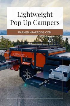 an orange and black truck with the words light weight pop up campers