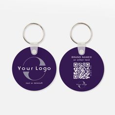 two round keychains with a qr code on one side and a logo on the other