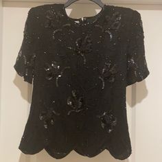 Beautiful Black Sequin Top- New With Tag Formal Black Embellished Blouse, Formal Black Embellished Tops, Elegant Short Sleeve Cocktail Tops, Embellished Black Tops For Cocktail, Black Embellished Evening Blouse, Black Embellished Blouse For Evening, Black Short Sleeve Evening Blouse, Black Short Sleeve Blouse For Evening, Purple Sequin Top