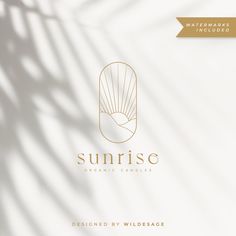 the logo for sunrise organic candles is shown on a white background with gold foiling