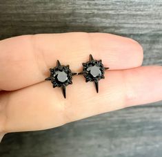 The Starburst stud earrings with Black CZ are the perfect accessory for those who love gothic and celestial styles. The shiny cubic zirconia stone adds a touch of elegance, making them a beautiful addition for both men and women. With their unique design and high-quality materials, these earrings are a must-have for any fashion-forward individual. Sold as Pair or Single Material: 316 Stainless steel Size: 14 mm long ,12mm wide Post:Regular piercing 24G Closure: butterfly push back Listing for pair of stud only *RETURNS / REFUNDS * -If you would like to return you purchase , please contact us within 7 days of receiving your package and we will accept the return.Return will only be made to the product, and not the shipping cost.  -Buyer is  responsible for the return shipping costs . -All je Gothic Stud Earrings, Black Emo Earrings For Gift, Black Pierced Emo Earrings, Black Metal Stud Jewelry, Black Internally Threaded Punk Plug Earrings, Nickel-free Gothic Black Plug Earrings, Nickel Free Black Piercings Gift, Nickel-free Black Piercings As Gift, Edgy Star-shaped Pierced Earrings