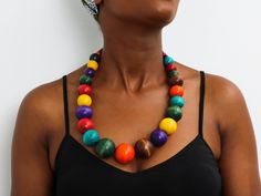 African wooden necklace, Statement Necklace, Wooden Bead Jewelry, Beaded women jewelry, Tribal necklace, Christmas gift for her, Mom's gift An elegant necklace that can compliments any outfit. Handmade by the Maasai women in Kenya using wooden beads. One size fits all. Color: Multi-color Necklace length: 20 inches 3-5 days delivery via DHL Express.  Pay shipping fee for the first item only and additional items ship for FREE. To view more wooden necklaces in our shop, kindly click here:  https://www.etsy.com/shop/NkoroiCrafts?ref=shop-header-name&listing_id=1295099274&section_id=43662872 Gift Wooden Beaded Necklaces, Gift Wooden Beads Necklace, Gift Beaded Necklaces With Wooden Beads, Wooden Bead Jewelry, Multicolor Necklace, Multi Coloured Necklaces, Wooden Necklace, Jewelry Beaded, Christmas Gift For Her